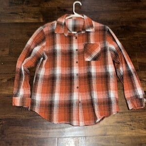 orange white and black plaid button up sweater